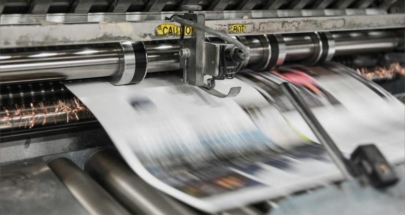 An offset printing press at work